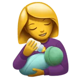 Woman Feeding Baby