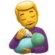 Man Feeding Baby